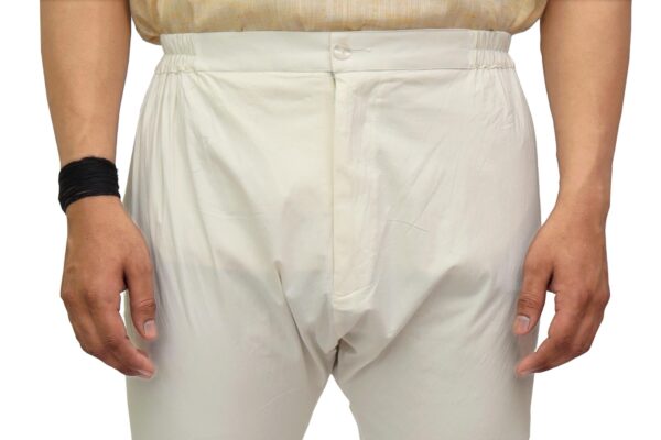 Close-up of ankle gathers on cream churidar pyjama – Patwa Jaipur