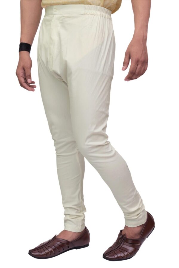 Side angle of slim-fit cream churidar pyjama for men – breathable cotton