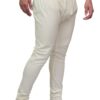 Side angle of slim-fit cream churidar pyjama for men – breathable cotton